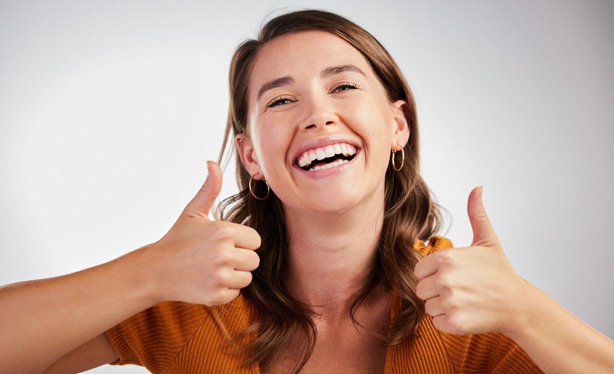 Woman showing bright white smile after whitening