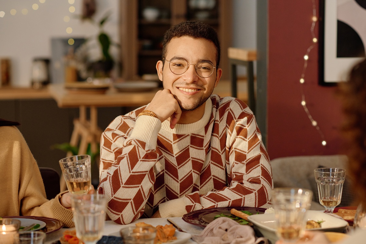 Patient smiling confidently after professional teeth whitening during a special event